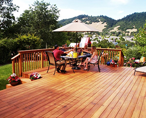 Homeowners-enjoying-a-redwood-deck